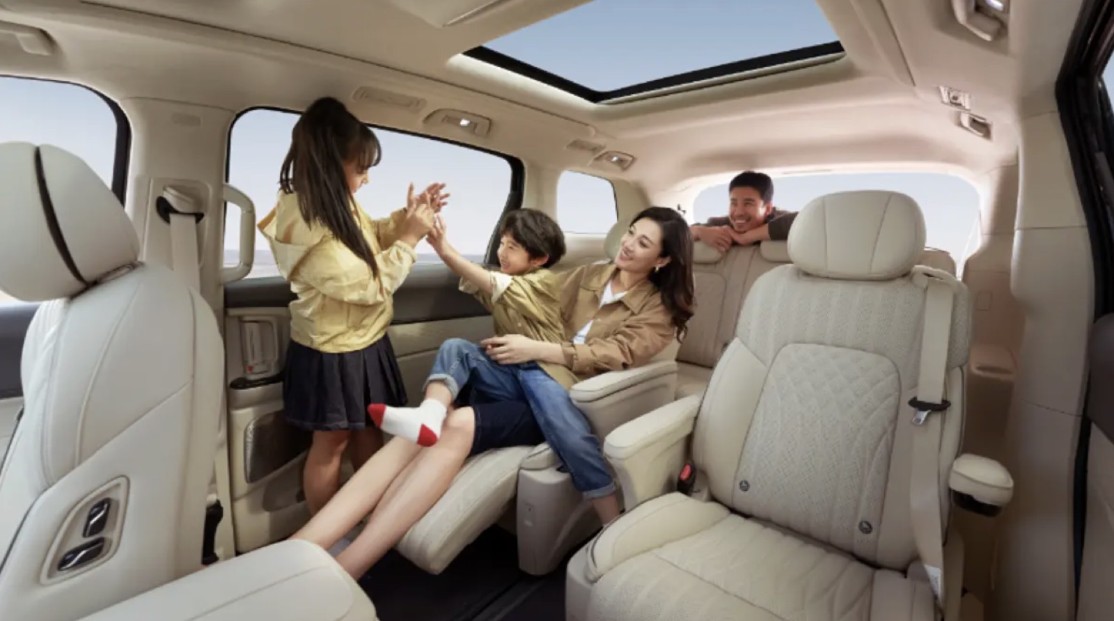 A family relaxing in a private luxury van