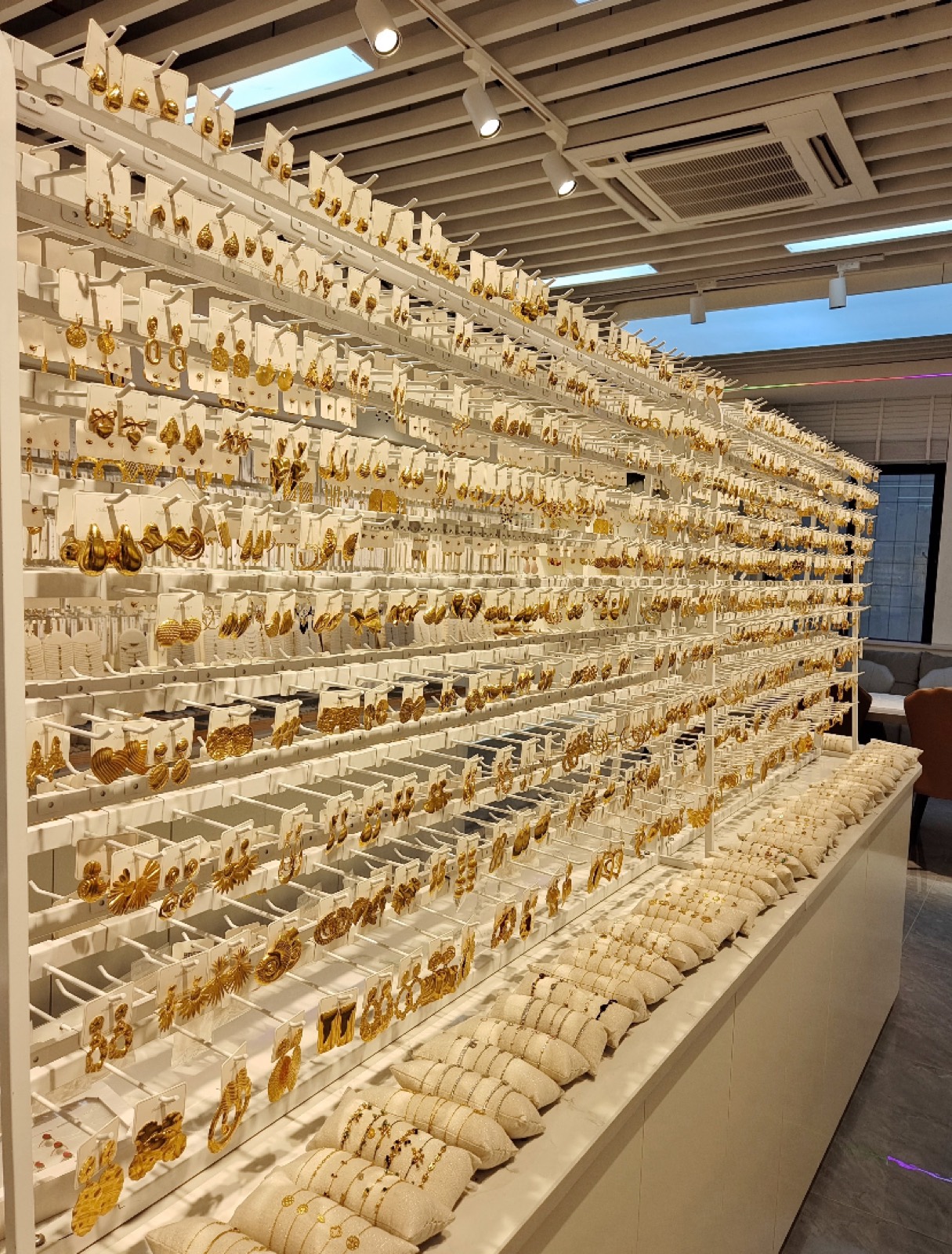 A wall of gold jewellery at a Guangzhou wholesale market