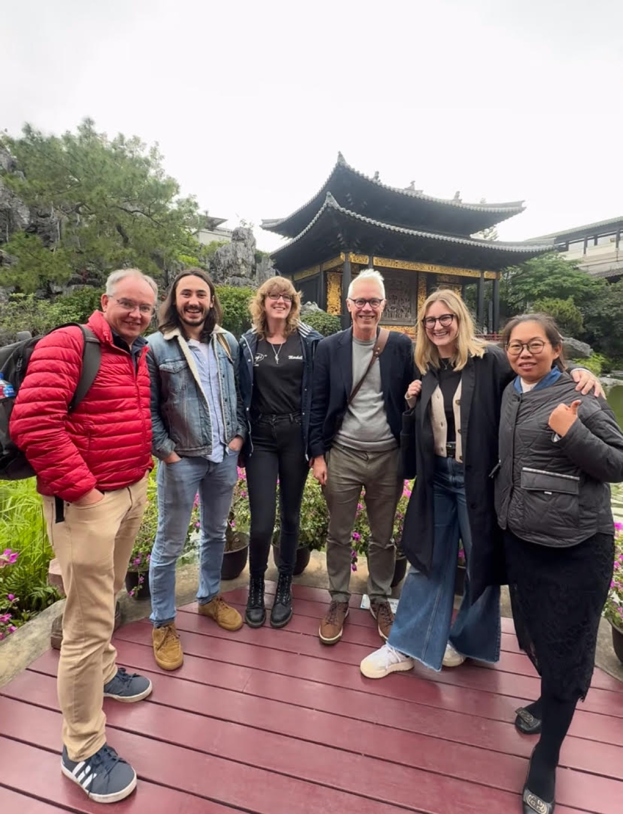 A local guide with travelers in old Guangzhou