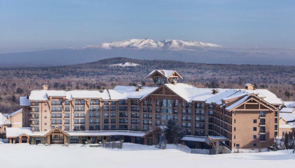 The snow-covered Wanda ski resort at Changbaishan with pine forest and mountain slopes