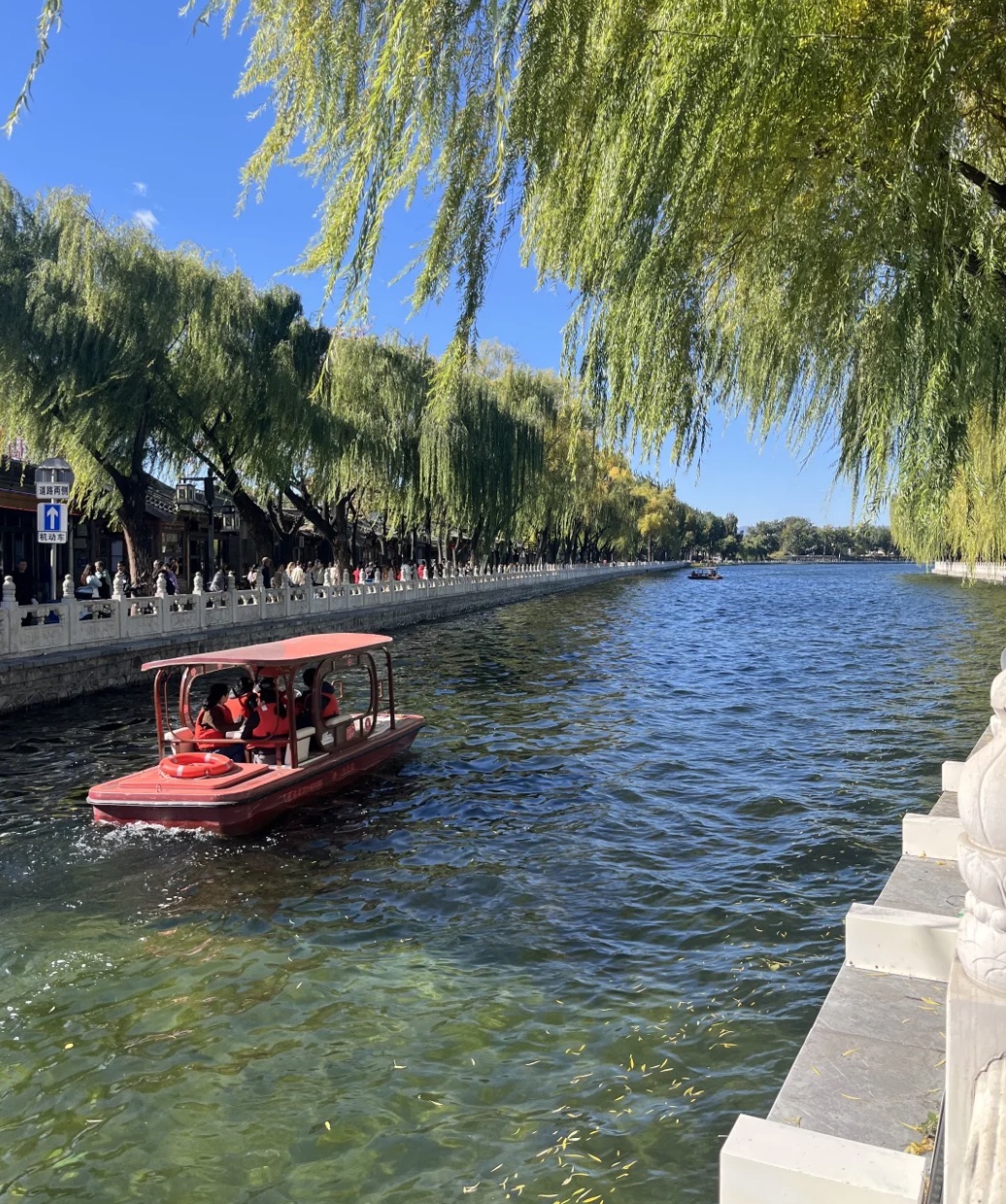 A boat ride on Shichahai lake amid old Beijing neighbourhoods