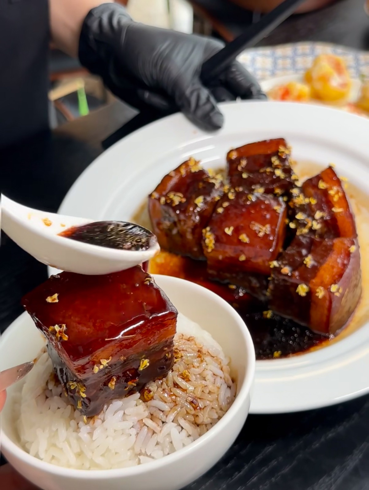 Glossy Shanghai red-braised pork belly served over rice