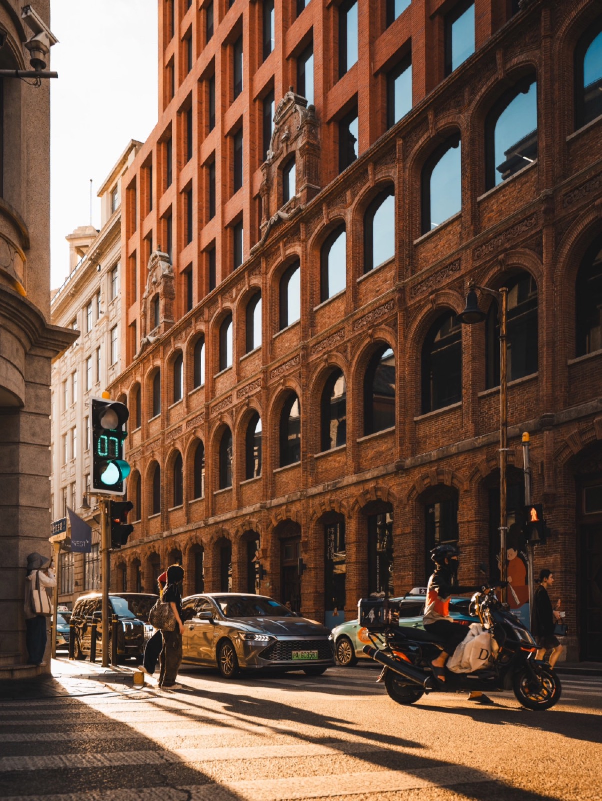 Golden-hour light on the historic red-brick architecture of Rockbund, Shanghai